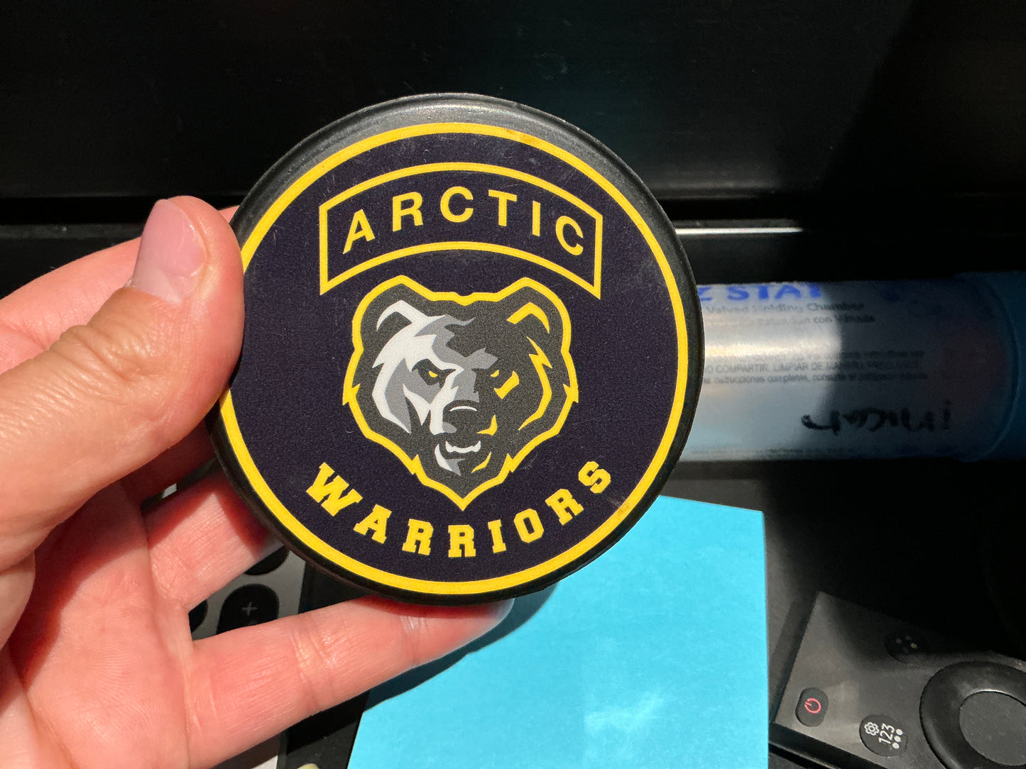 Arctic warriors hockey puck bottle opener
